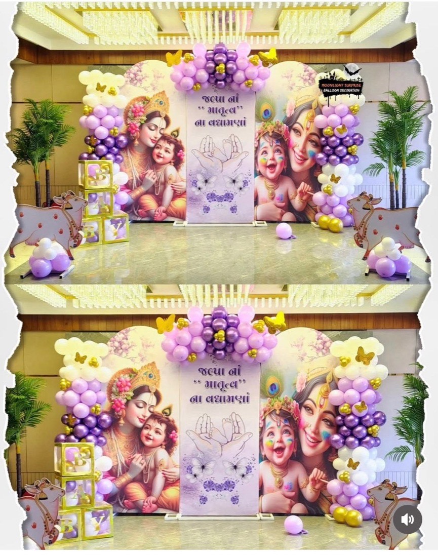 First birthday decoration in Hyderabad with a pastel balloon arch and printed name backdrop