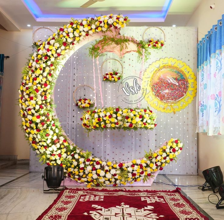 Barasala naming ceremony decoration in Hyderabad with a decorated cradle and floral backdrop