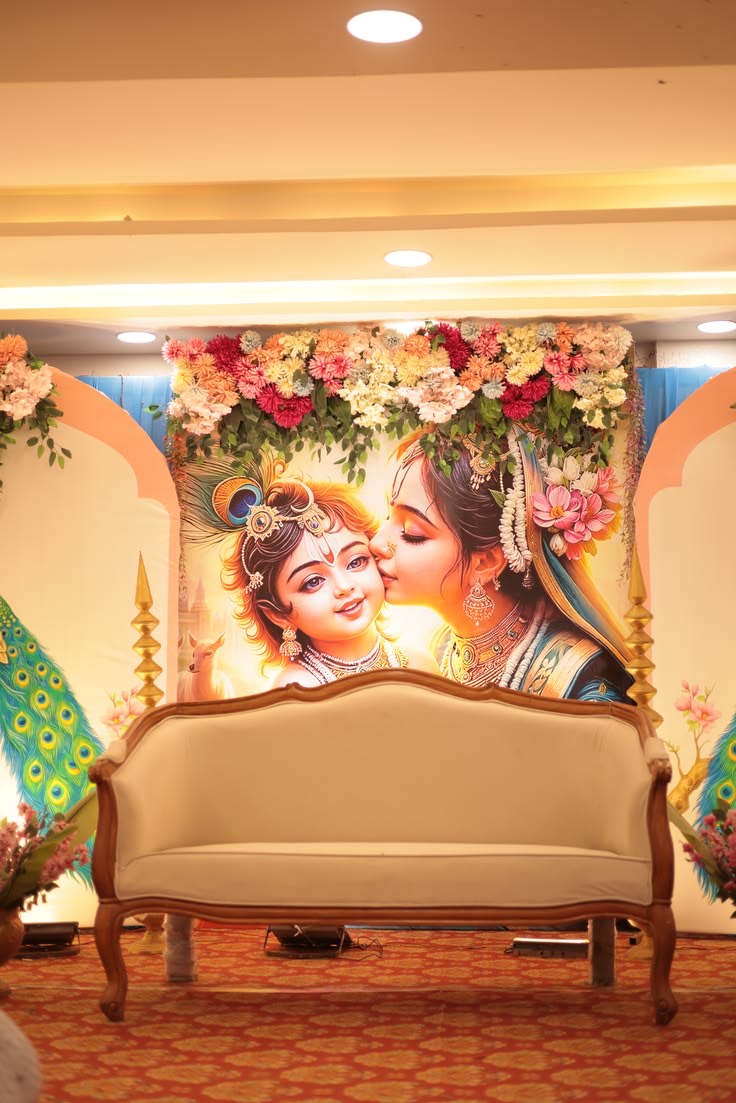 Reception stage in Hyderabad with layered floral panels and warm stage lighting