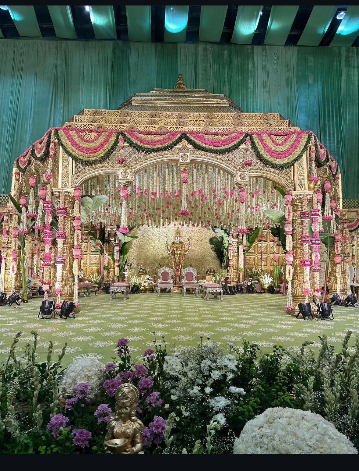 Wedding mandap in Hyderabad with floral pillars, built by the same team that sets up engagement stages